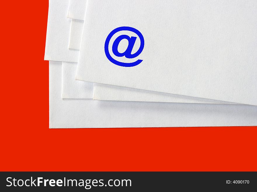 Stack of e-mail letters, isolated on red background