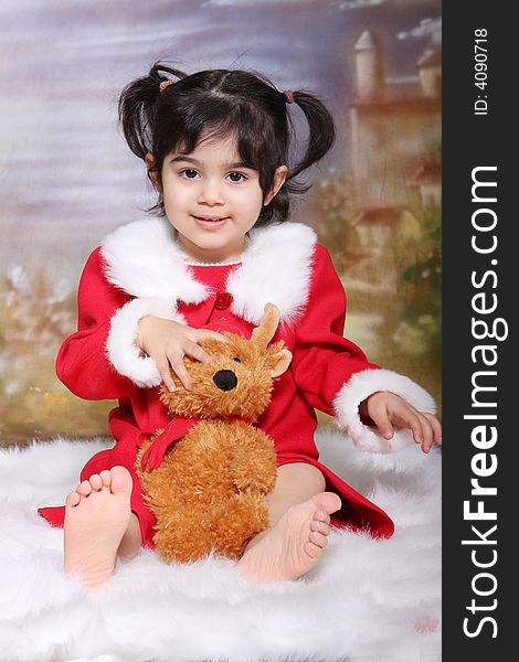 Toddler sitting with her teddy for her Valentine's day photoshoot. Toddler sitting with her teddy for her Valentine's day photoshoot