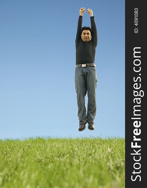 Shot of a man jumping up with joy. with copyspace. Shot of a man jumping up with joy. with copyspace