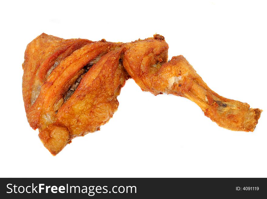 Photograph of fried chicken isolated in white
