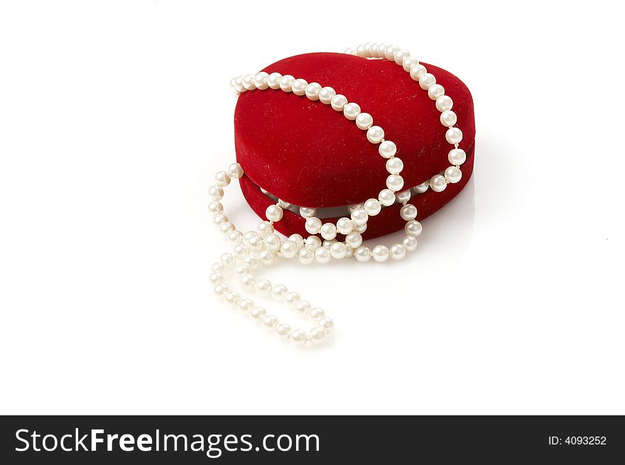 Heart shaped box chained with pearls isolated on white. Heart shaped box chained with pearls isolated on white