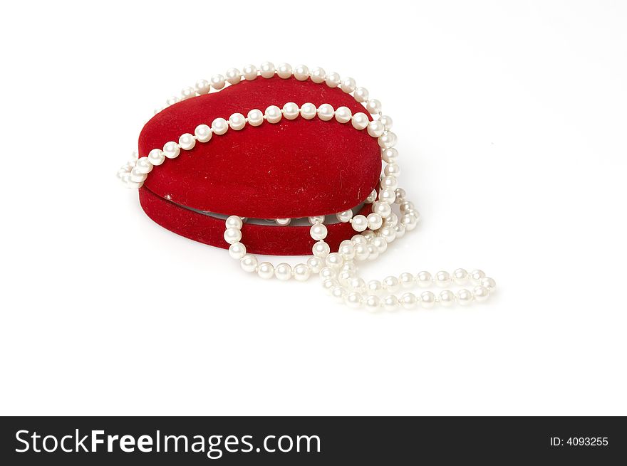 Heart shaped box chained with pearls isolated on white. Heart shaped box chained with pearls isolated on white