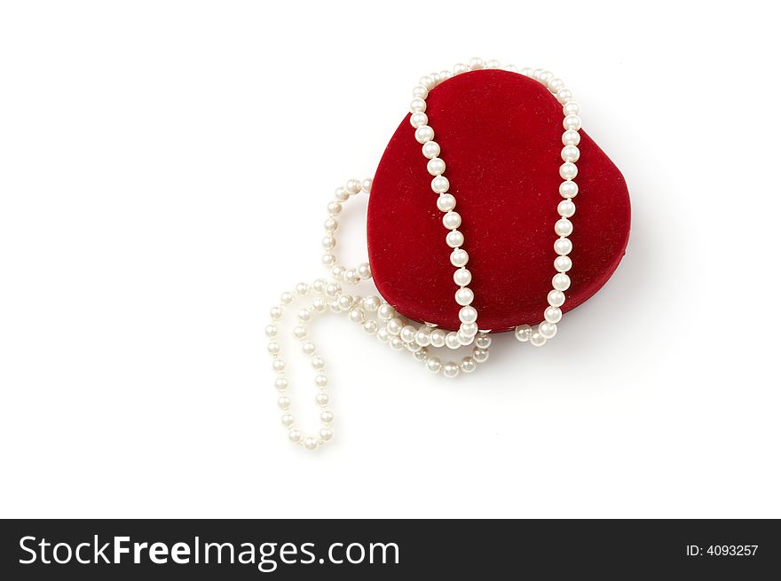 Heart shaped box chained with pearls isolated on white. Heart shaped box chained with pearls isolated on white