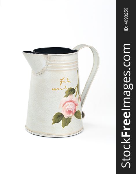 Beautiful painted watering-can on white