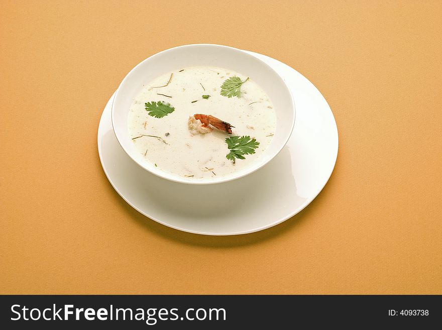 Shrimp soup in white bowl