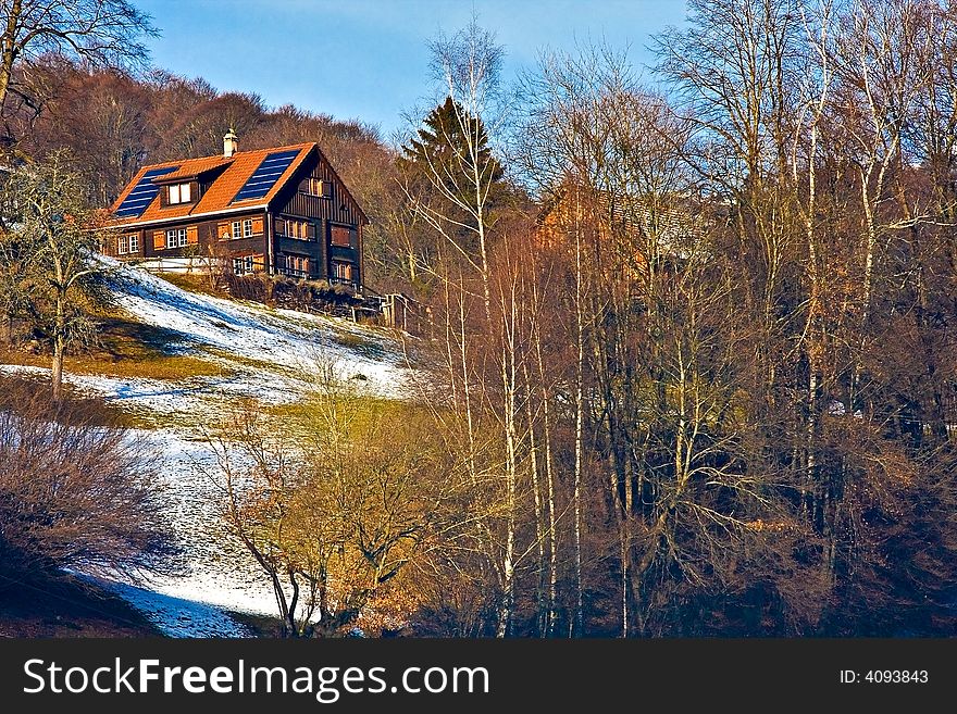 Winter view of typical swiss farm house. Winter view of typical swiss farm house