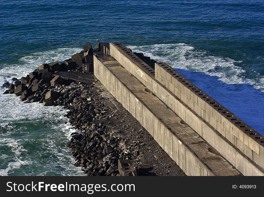 An image of a Jetty construction in the sea