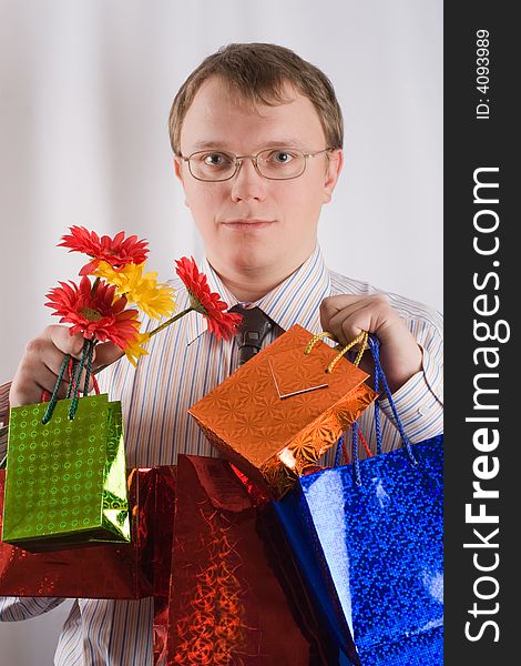 The man with presents and flowers