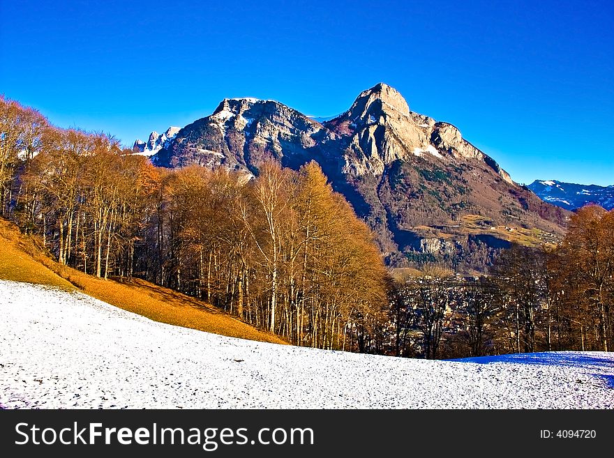 Country landscape with fields and mountains. Switzerland