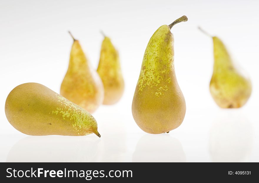 Five pears on white background