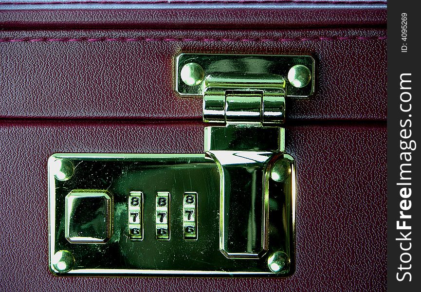 Combination lock on a case of a businessman