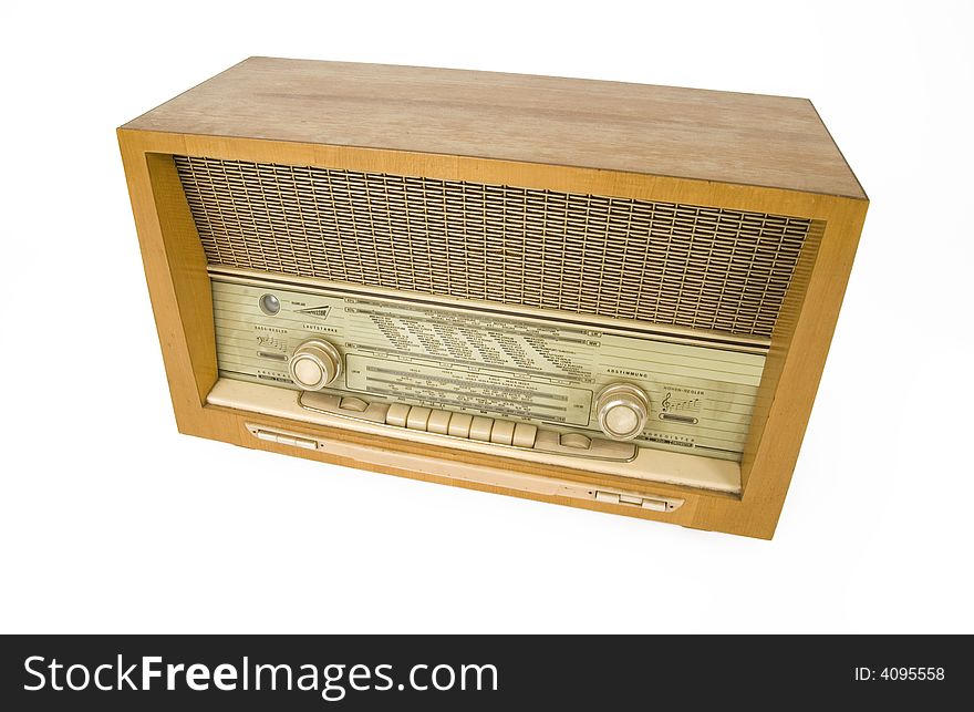 An old radio on a white background. An old radio on a white background.