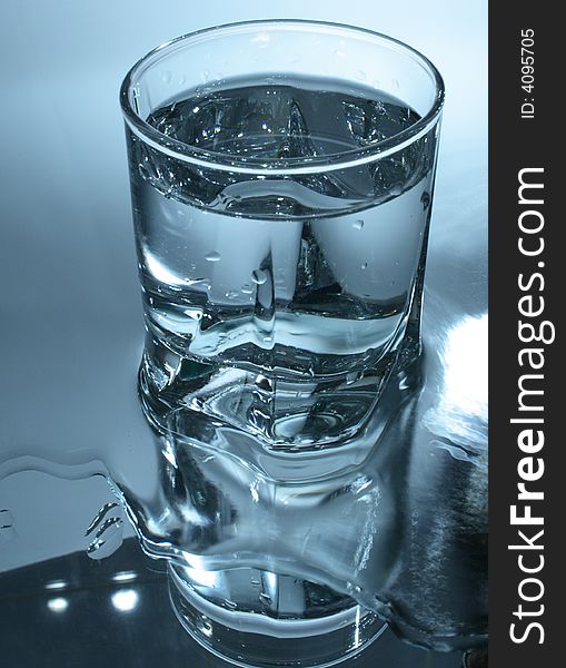 Glass Of Water In Dark-blue