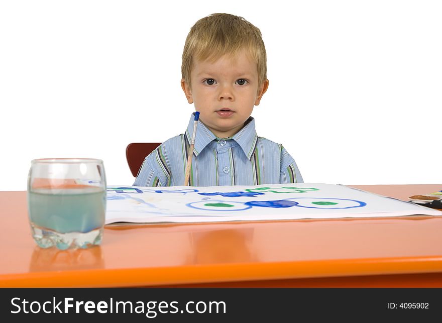 A child paints a picture. A child paints a picture.