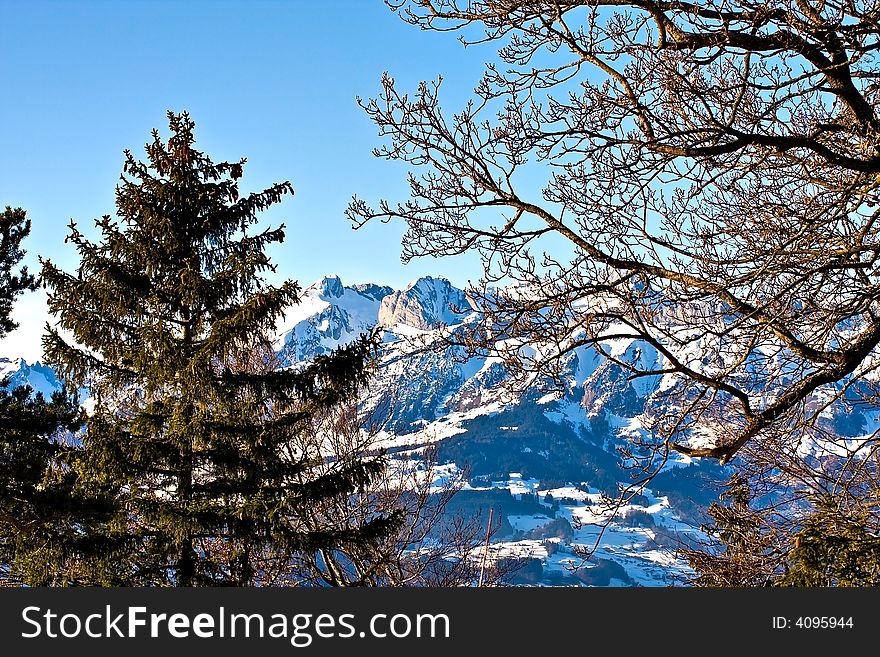 Winter view of typical swiss mountains. Winter view of typical swiss mountains