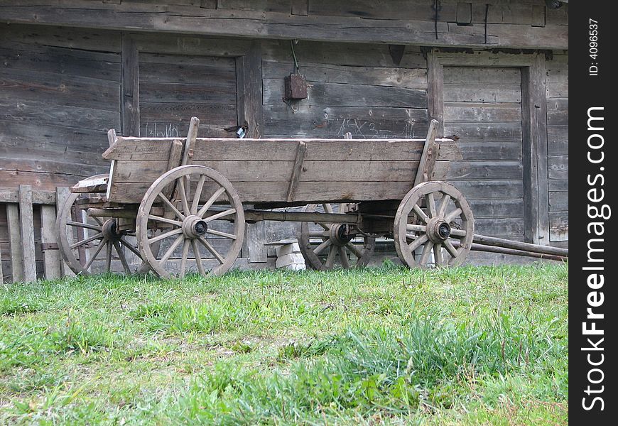 The old coach in front of the house