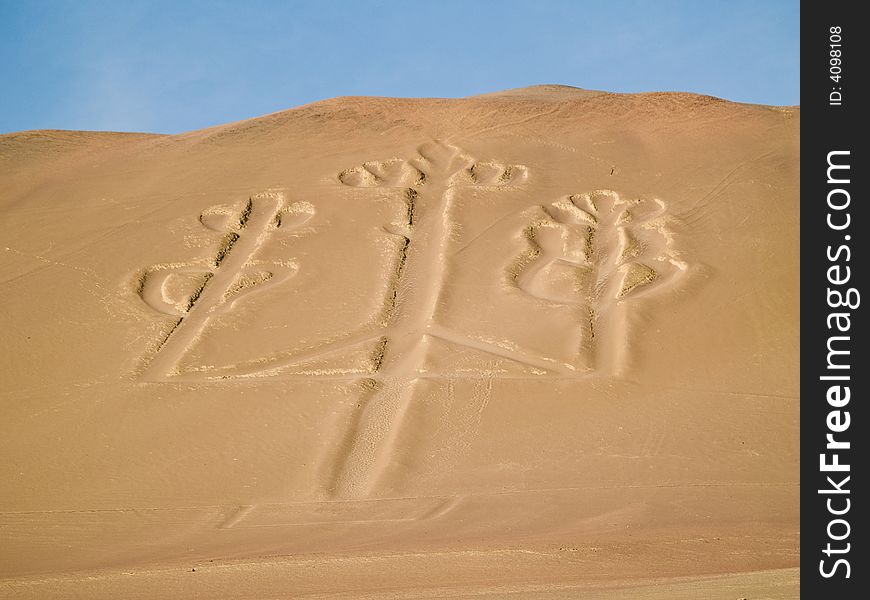 Ancient Candelabrum figure in Paracas national park. Ancient Candelabrum figure in Paracas national park