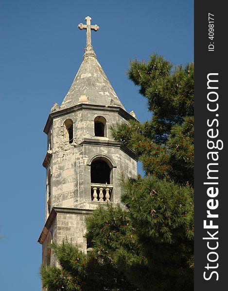 Cross church steeple stone ancient sky god