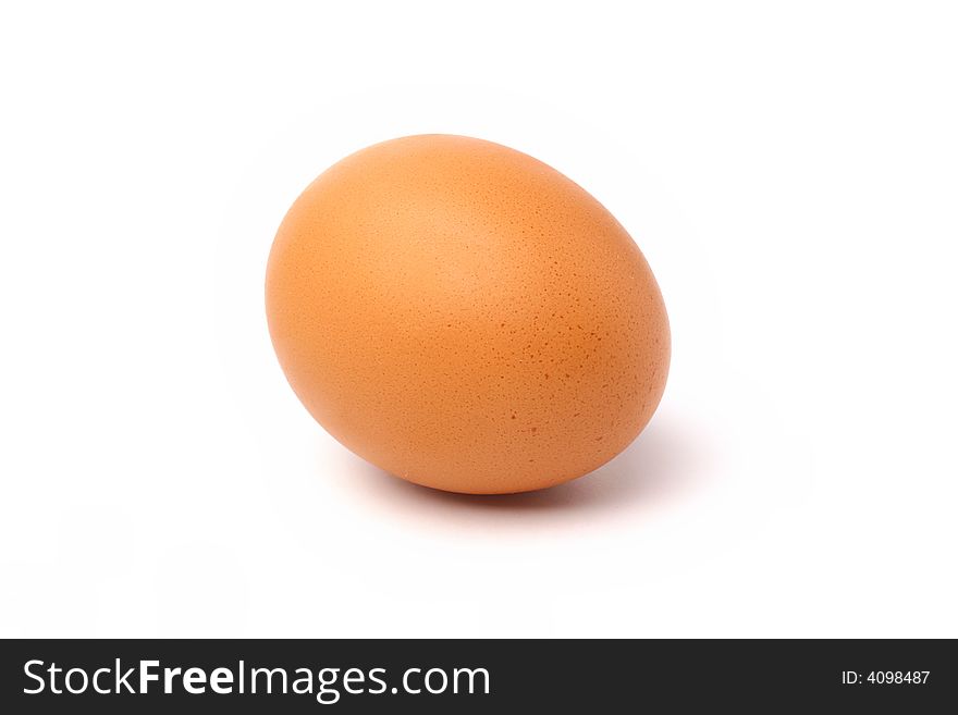 Closeup of a speckled brown chicken egg