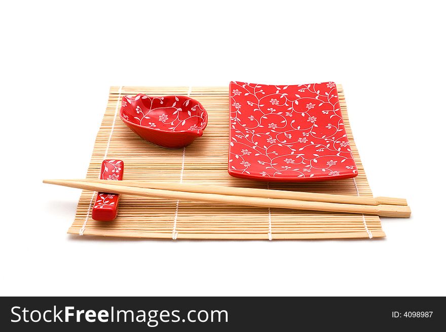 Red sushi set on bamboo mat