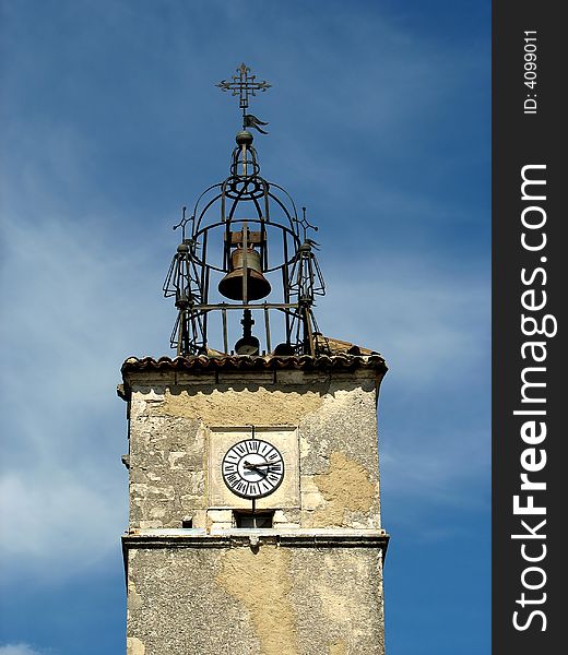 Old clock tower in Carpentras France with bell
