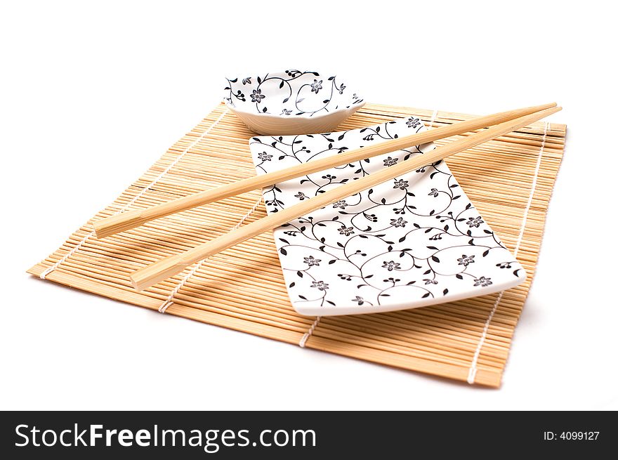 White sushi set on bamboo mat