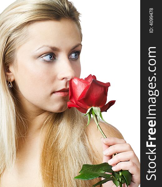 Blonde girl with blood red rose in hands. Blonde girl with blood red rose in hands