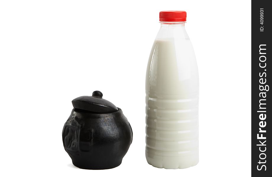 Jug and bottle with milk