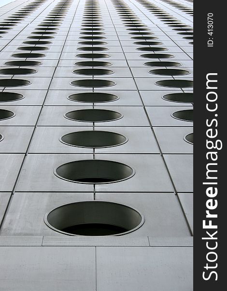 Taken from an interesting viewpoint - this is a pattern of circular windows of a skyscraper/office tower in Central, Hong Kong. Taken from an interesting viewpoint - this is a pattern of circular windows of a skyscraper/office tower in Central, Hong Kong.