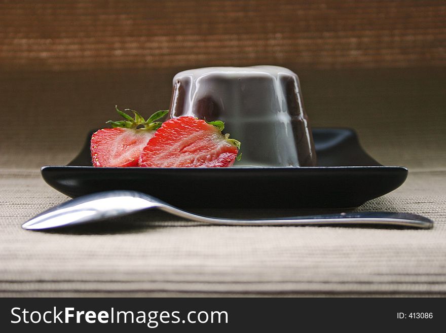 Chocolate pudding with strawberries