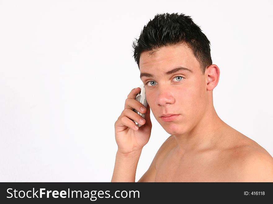 A portrait of a Topless male on his phone