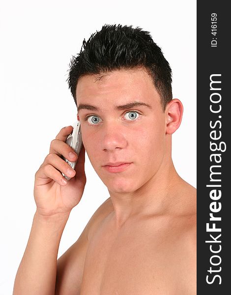 A portrait of a Topless male on his phone