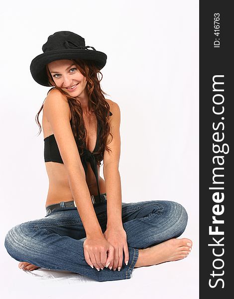 Model posing with her hat on. Model posing with her hat on
