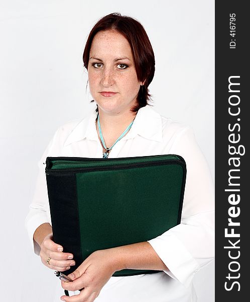 Businesswoman standing with file. Businesswoman standing with file