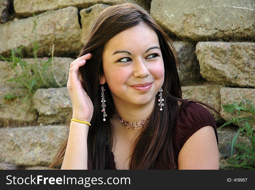 Photo of a young girl outdoors. Photo of a young girl outdoors