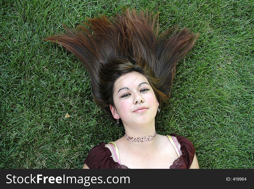 Photo of a young girl outdoors. Photo of a young girl outdoors