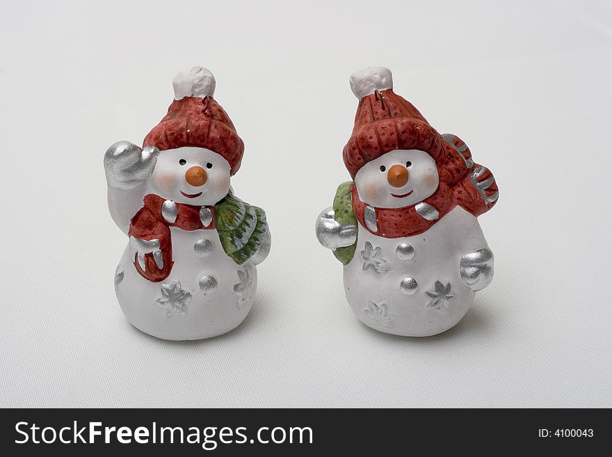 Two Snowmen on the white backgrounds