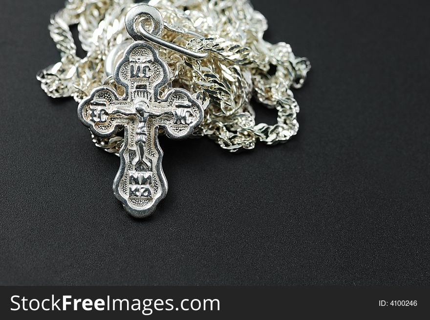 Silver chain with a dagger. The crucifixion. Silver chain with a dagger. The crucifixion