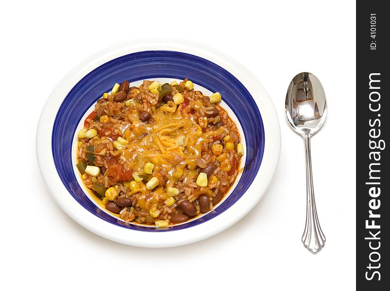 My recipe - bowl of vegetarian  rice and beans.  White background and large spoon.