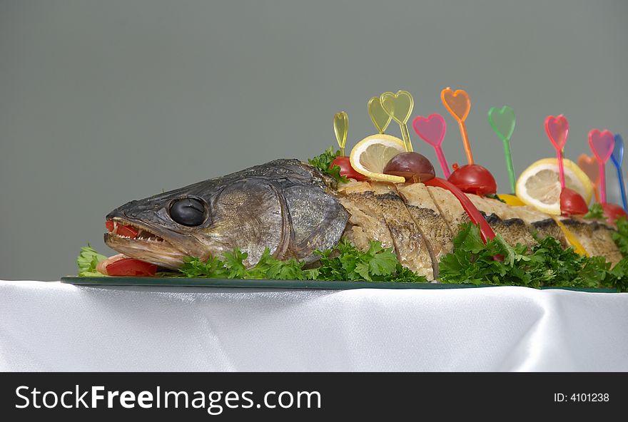 Stuffed pike fish with vegetables and fruits