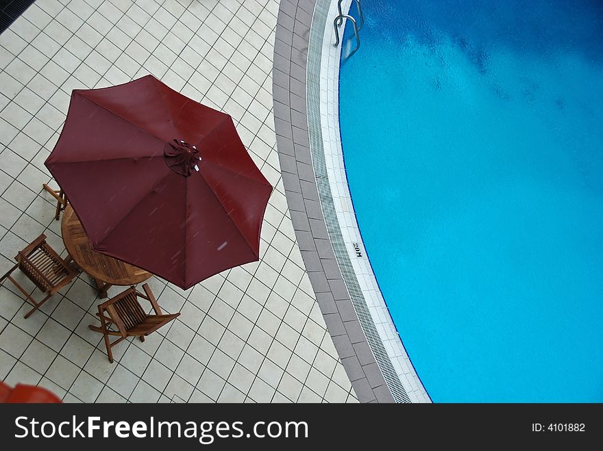 Swimming pool and umbrella in the hotels