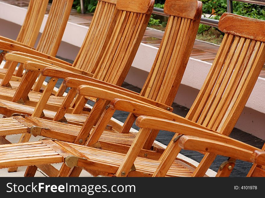 Wooden Chair At The Pool Side