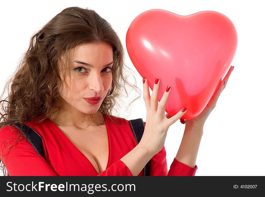Attractive young woman holding heart shape balloon. Attractive young woman holding heart shape balloon