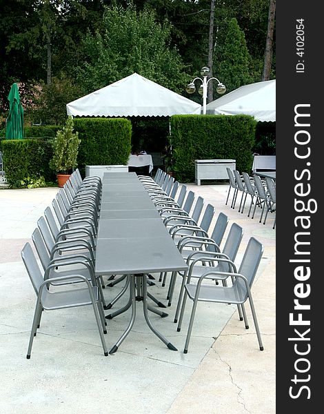 A long table in the middle of the garden. A long table in the middle of the garden