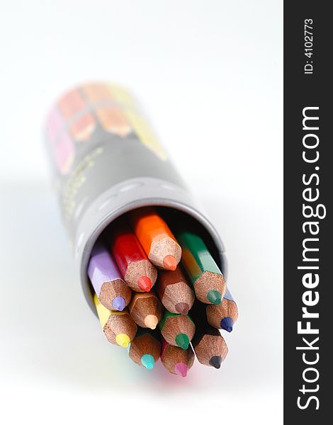 Colorful pencils in a box