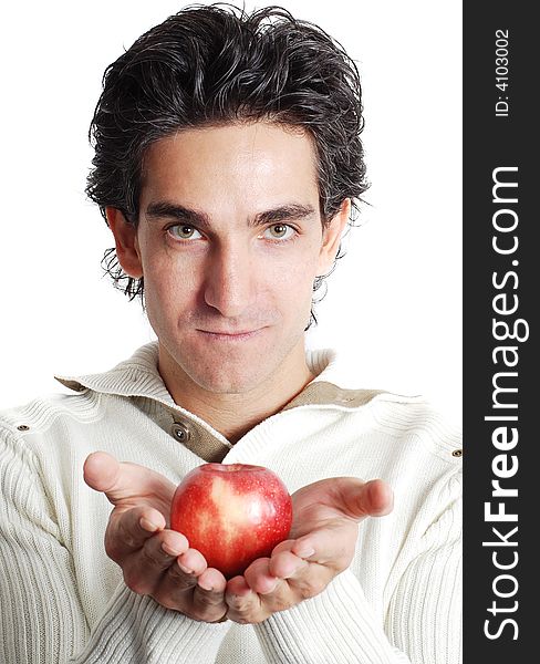 A man is holding fruit in his hands. A man is holding fruit in his hands