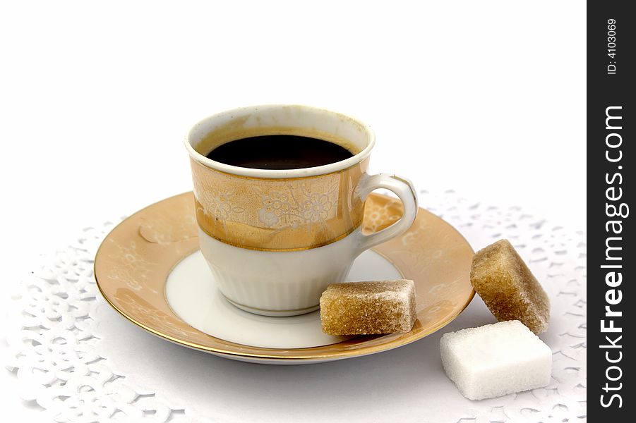 Cup of coffee with clumps of sugar