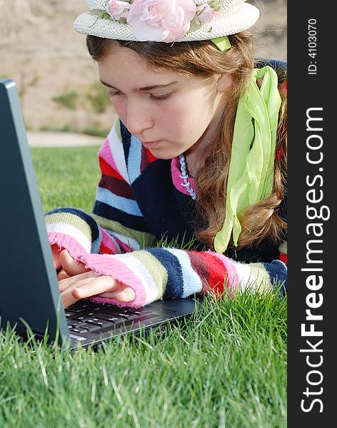 Young girl and laptop
