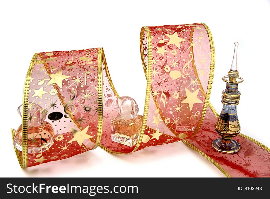 Perfumed gift with golden ribbon. Perfumed gift with golden ribbon