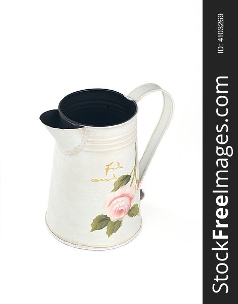 Beautiful painted watering-can on a white